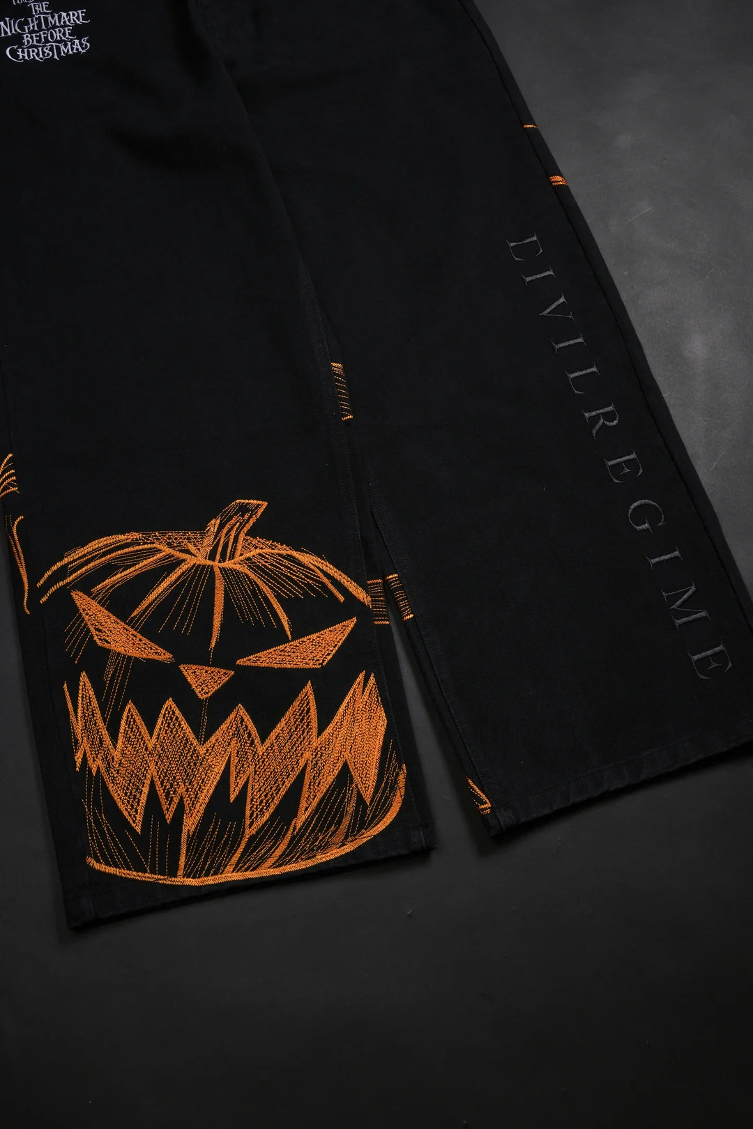 PUMPKIN FREIGHT RAW DENIM JEANS IN BLACK/HALLOW ORANGE